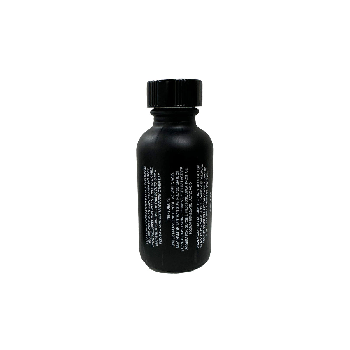 Black container of mandelic acid serum