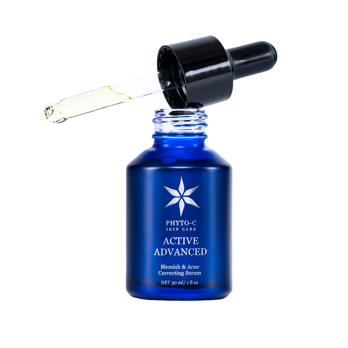 A blue bottle with a dropper cap labeled 'PHYTO-C ACTIVE ADVANCED' containing a blemish & acne correcting serum.