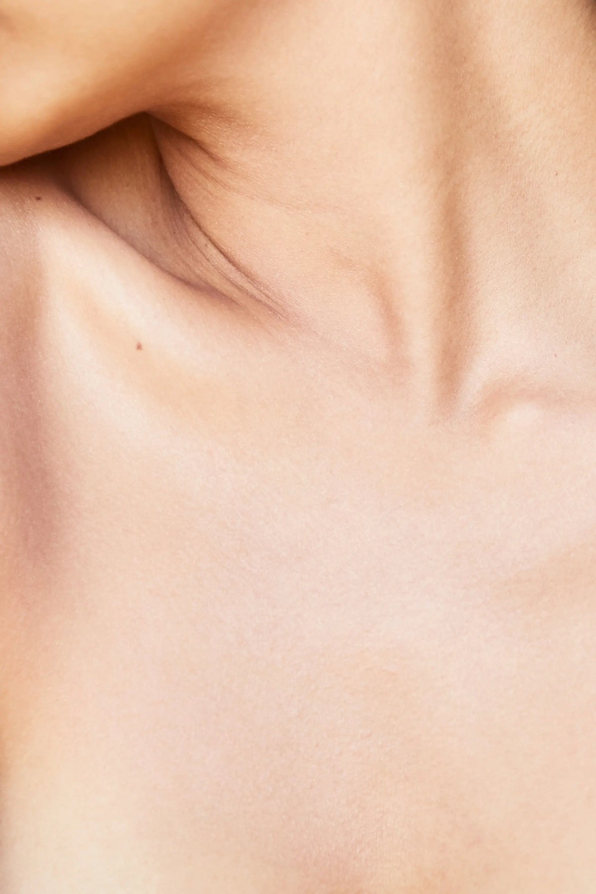 Side profile of a woman's face and neck
