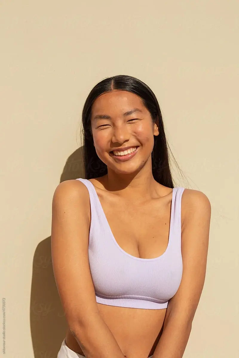 Woman with smooth, lifted facial contours, alternate pose