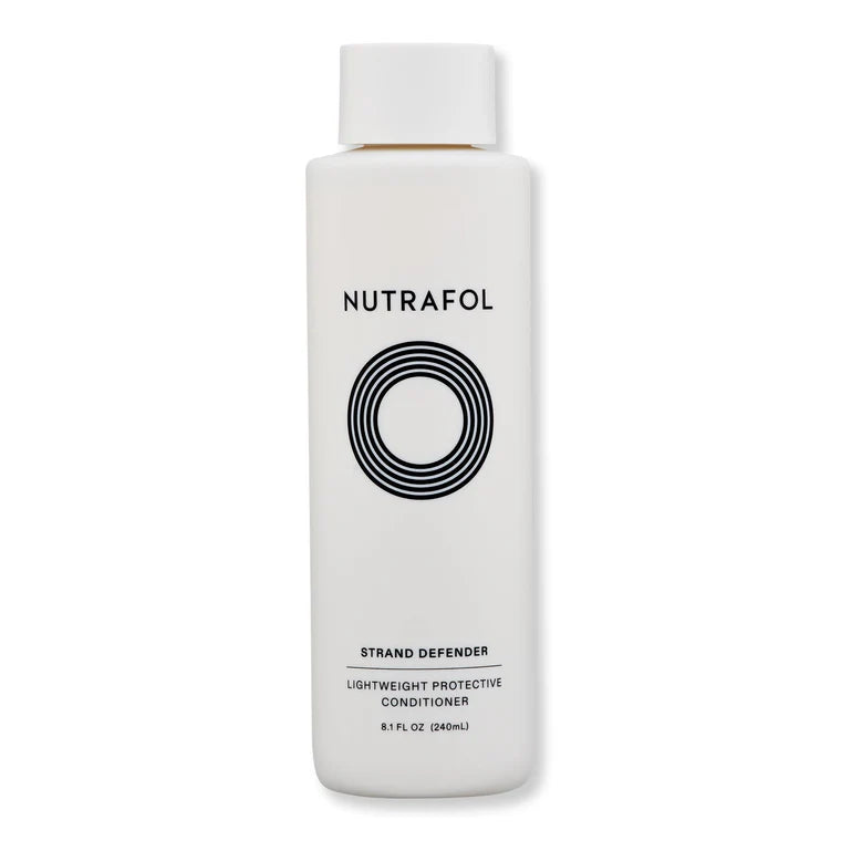 A bottle of Nutrafol Strand Defender Lightweight Protective Conditioner